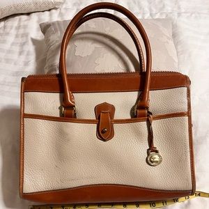 Dooney & Bourke off white and brown leather handbag.